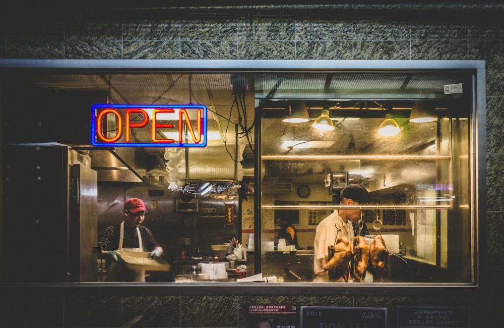 person standing in kitchen during nighttime