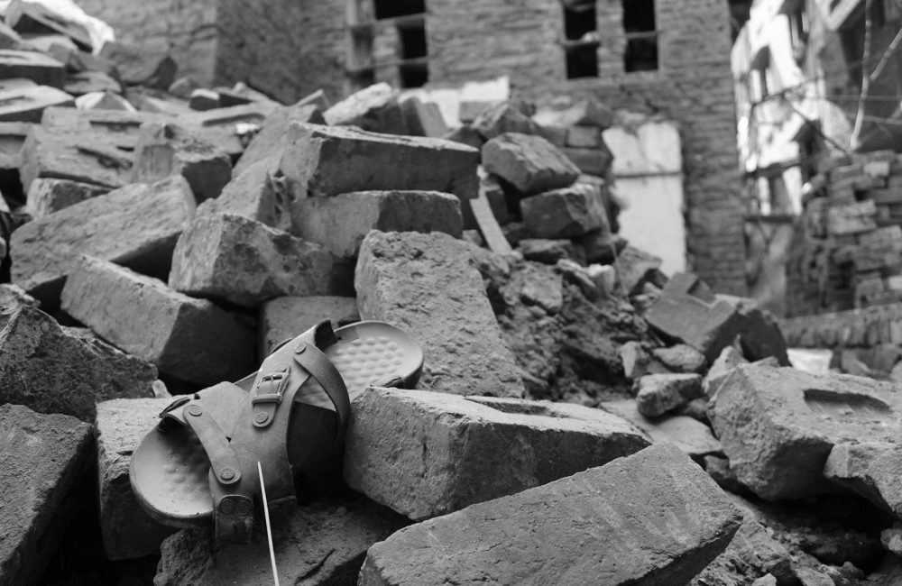 Shoe in Ruins after Earthquake