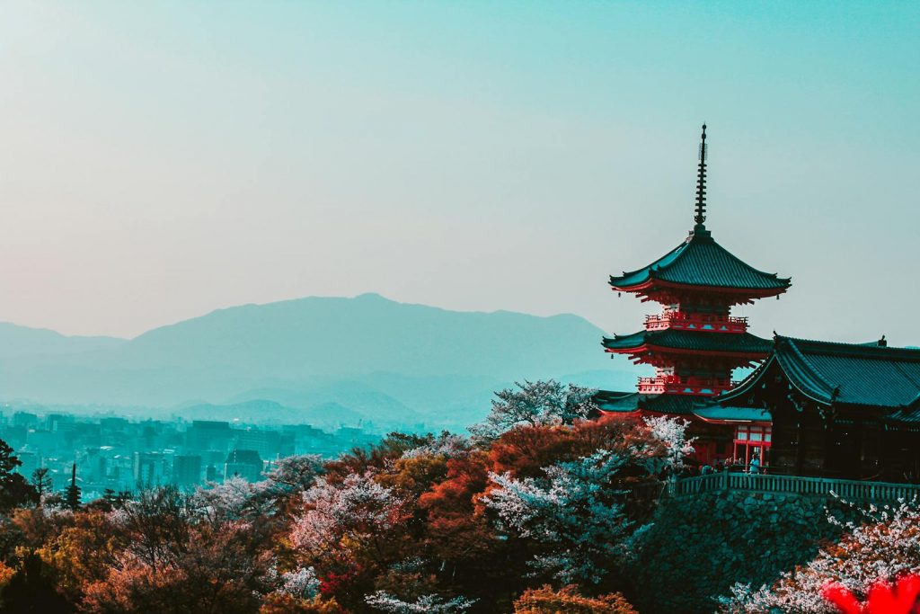 Top 15 Most Romantic Honeymoon Destinations: Unforgettable Escapes for Newlyweds 8 Red and Black Temple Surrounded by Trees Photo