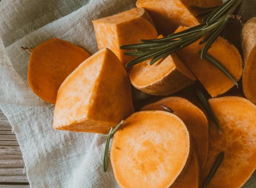 Close-Up Photograph of Chopped Sweet Potatoes on a Cloth