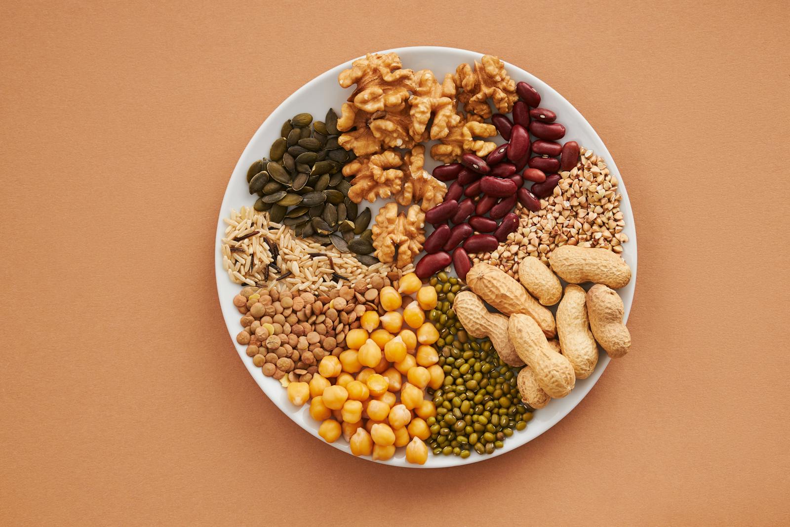 16 Best Foods for Plant-Based Protein Sources 1 Nuts and Beans on Plate