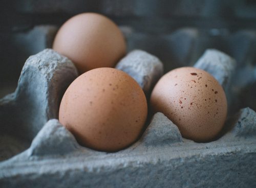 Selective Focus Photo of Three Eggs on Tray