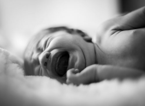 a baby with its mouth open