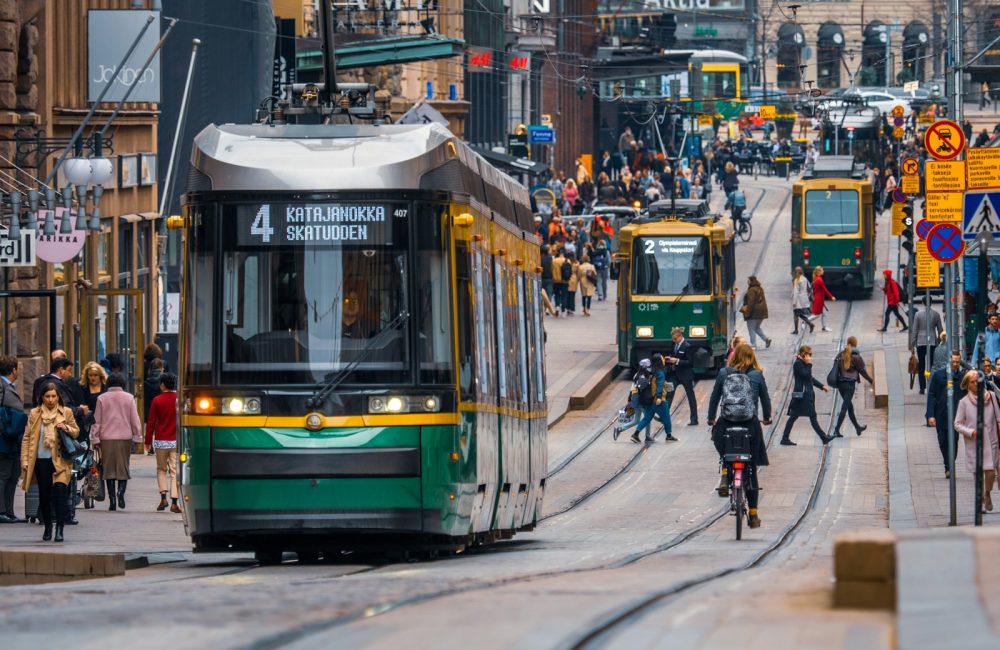 green and yellow city tram
