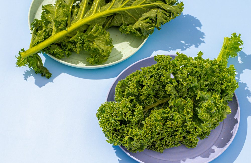 a couple of plates of broccoli on a table