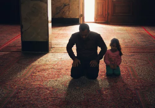 Graph showing rising Muslim population trends in Western countries with mosque silhouette