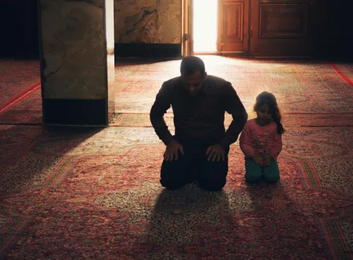 Graph showing rising Muslim population trends in Western countries with mosque silhouette