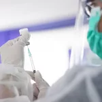 Doctor explaining anesthesia safety to patient before surgery