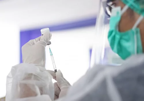 Doctor explaining anesthesia safety to patient before surgery